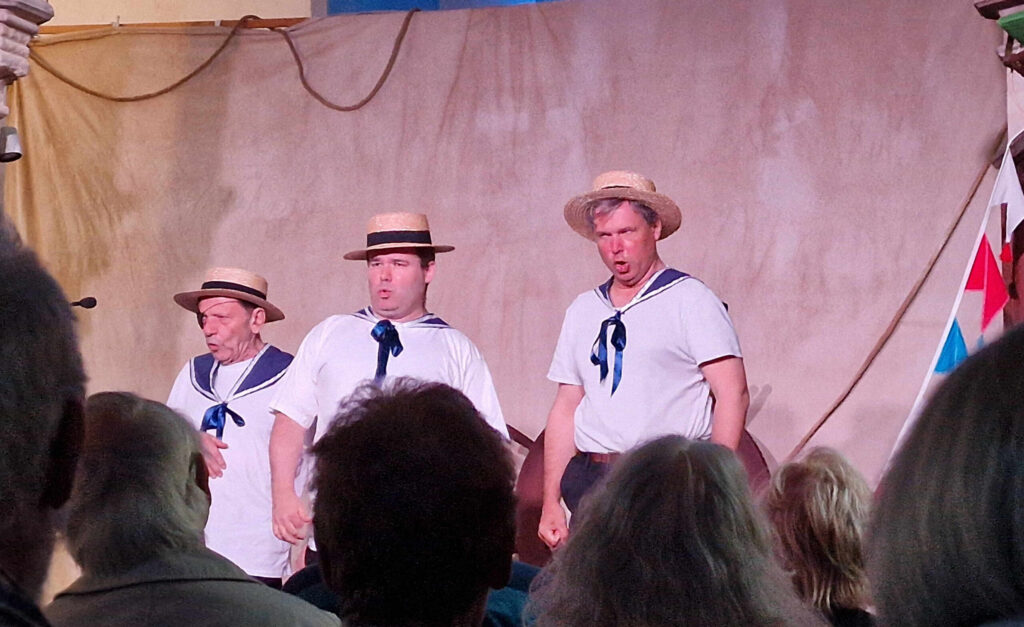 Three sailors singing